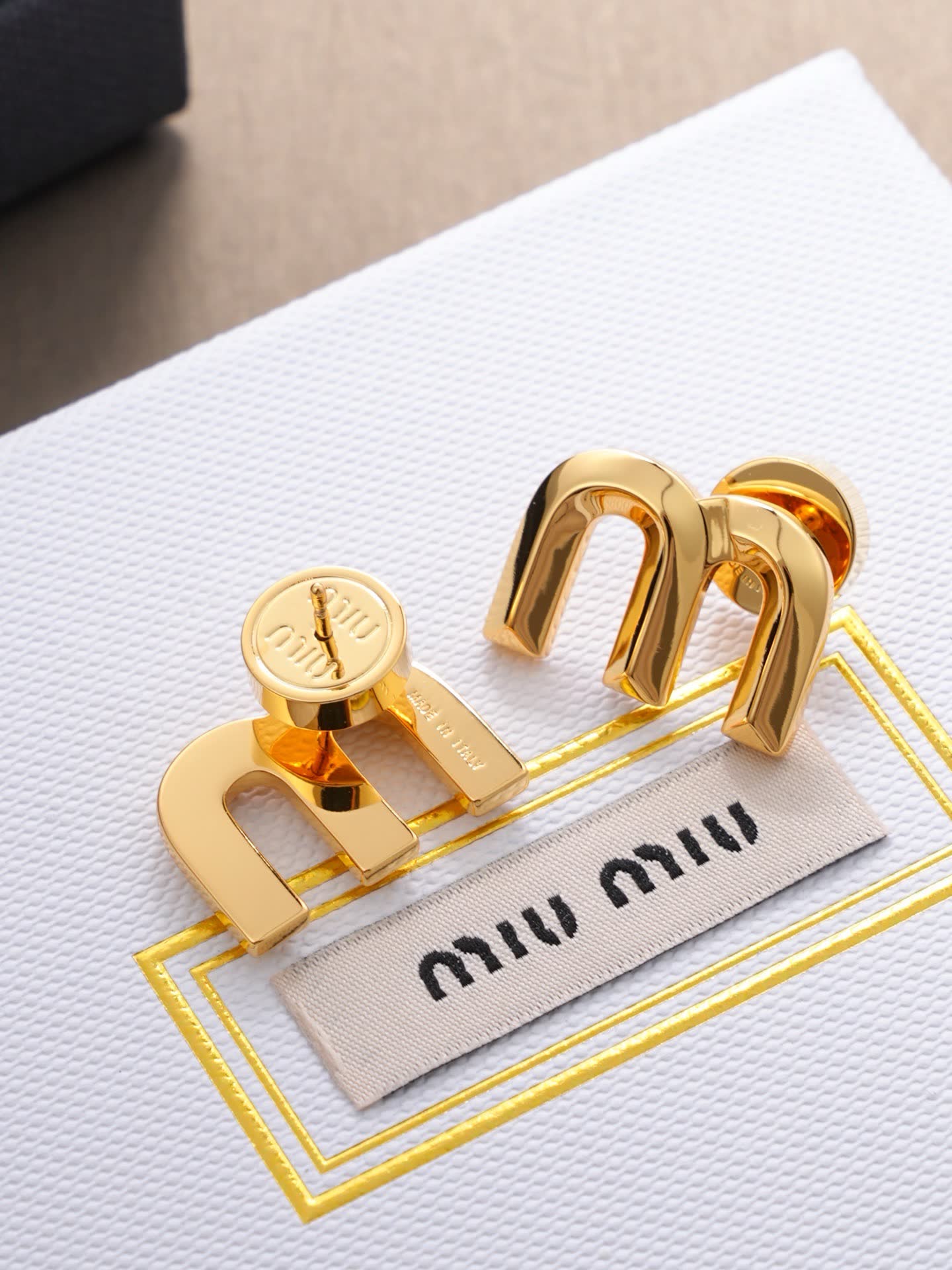 Miu Miu Gold Tone 'M' Stud Earrings